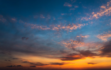 Sunset sky with beautiful orange clouds.