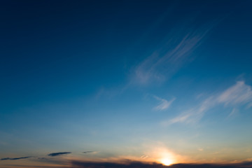 Sunset sky with beautiful orange clouds.