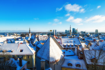 Fototapeta na wymiar A view over the rooftops of old Tallinn frosty morning