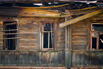 The image of a old wooden house.