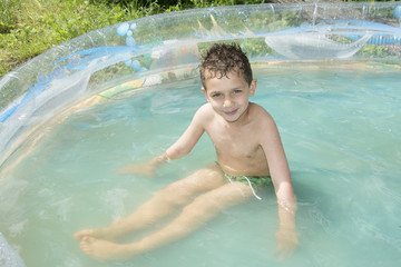 In summer, the garden is bathed in an inflatable pool boy.