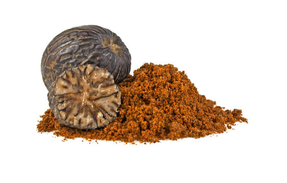 Nutmeg and its powder isolated on a white background