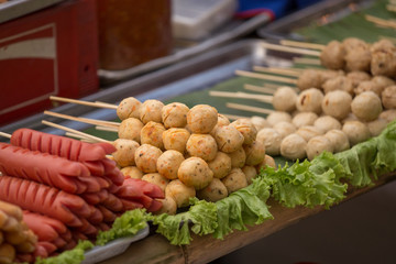 The grilled sausage and meat ball in Thai style