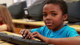 Cute pupils in computer class 