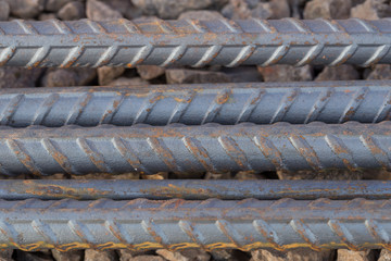 Steel rods or bars used to reinforce concrete