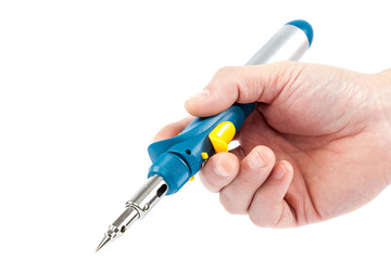 Gas soldering iron in hand on a white background.