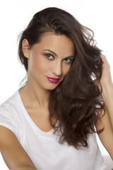 Fototapeta premium smiling beautiful young woman on a white background