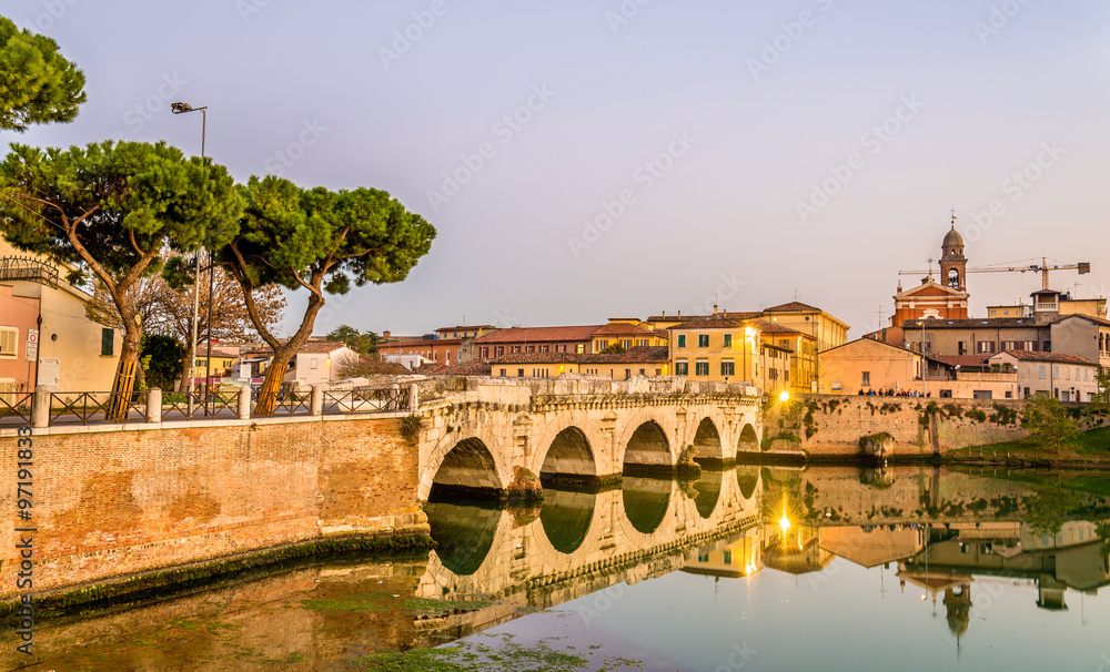 Wall mural view of rimini above a lake - italy