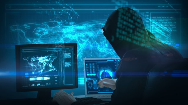 Composite video of hacker using laptop