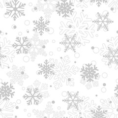 Seamless pattern of snowflakes, gray on white