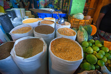 Tropical marketplace with sacks full of food ingredients