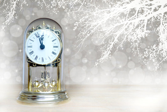 Happy New Year: Antique clock striking midnight