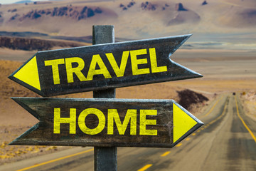 Travel - Home signpost in a desert road on background