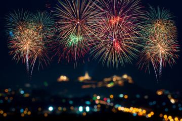 Fototapeta na wymiar Beautiful firework display for celebration with blur bokeh light
