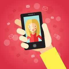 Smart phone in hand. On the red background with envelopes and dots. Video call with girl (blonde long hair).
