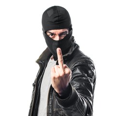 Robber making horn gesture