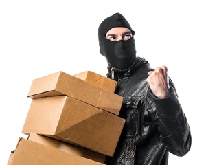 Robber holding boxes