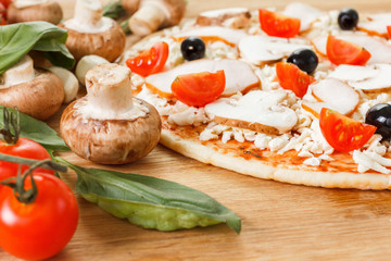 Food ingredients for pizza on table close up