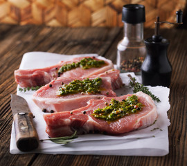 Pork chop raw spices and sauce