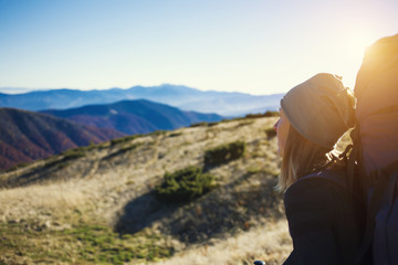 Naklejka premium She travels with a backpack.