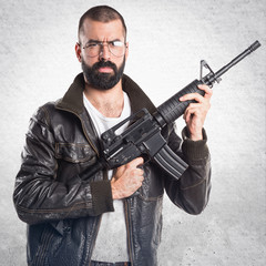 Fototapeta premium Pimp man holding a rifle
