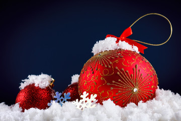 Merry Christmas concept balls in snow, greeting