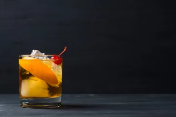 Wall murals Cocktail Old fashioned cocktail with cherry and orange peel