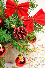 Christmas decoration, pine twig, christmas baubles on celebratio