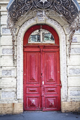 Fototapeta na wymiar Ancient wooden entrance door