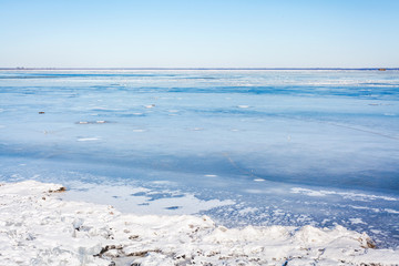 View of  very broad frozen river