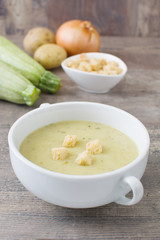 Zucchini soup with onion, garlic and potatoes