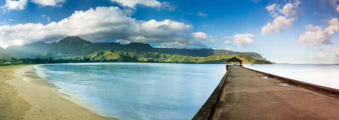 Widescreen panorama of Hanalei Bay and Pier on Kauai Hawaii - obrazy, fototapety, plakaty