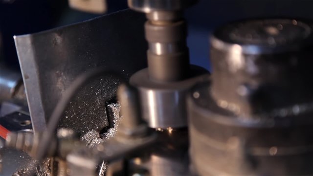 Oiled roller spins in machine tool of rolling mill