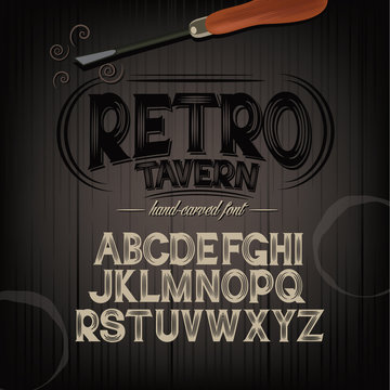 Stylized pub tavern bar carved hand drawn font alphabet. Perfect for label design. Carvings are knocked out of letters and lets background show through. EPS 10 royalty free vector illustration.