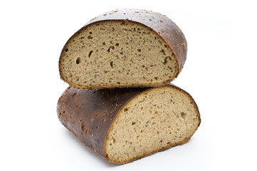 Fototapeta na wymiar Dark rue bread on a white background.
