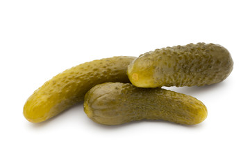 Pickled cucumbers isolated on white background.