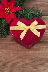 Heart box with branch on wood