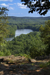 Obraz premium Trees framing Hart Ponds below ridge of Ragged Mountain, Connecticut.