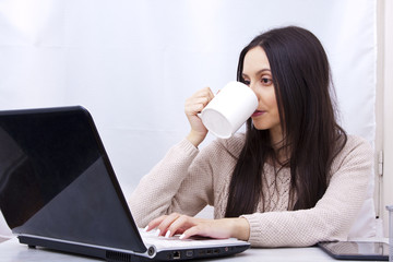 young woman in the office with computer