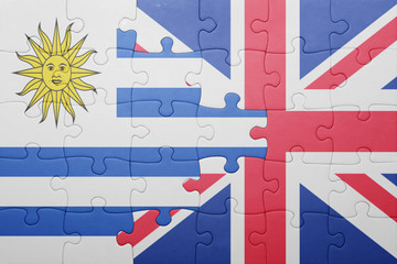 puzzle with the national flag of great britain and uruguay
