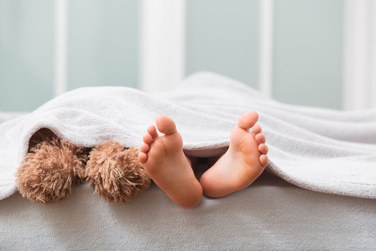 Feet In Bed
