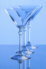 martini glasses on a blue background