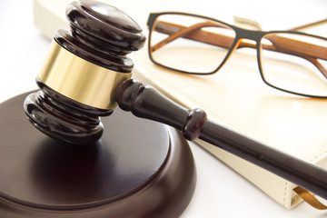 Mallet of justice. Law concept. Gavel and glasses