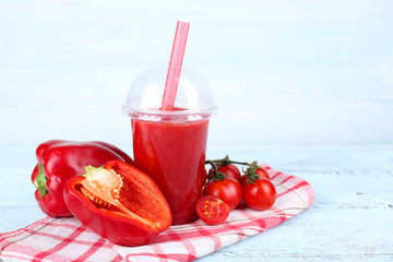 Fresh juice mix fruit and vegetables, healthy drink on wooden table, on light background