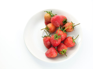 Strawberry/Fresh strawberry on white dish. Top view.