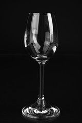 Empty glass on black background