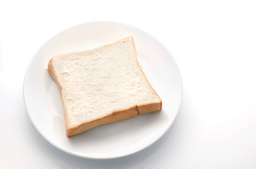 Sliced bread/Sliced bread on white plate.