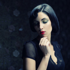 Fashion woman portrait. Beauty girl with black hair.