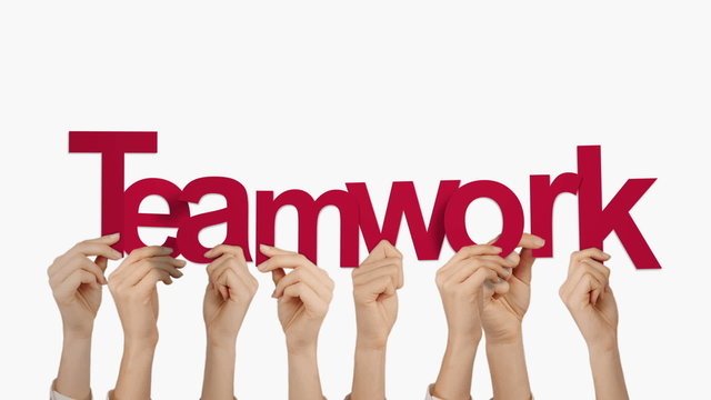 Hands holding up teamwork
