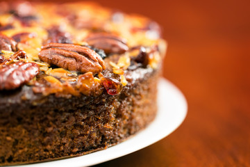 Pecan cake made with sliced almonds and dried cranberries